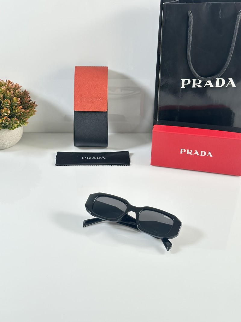 110 Prada 8679 Black Sunglasses with dark lenses and angular geometric frame