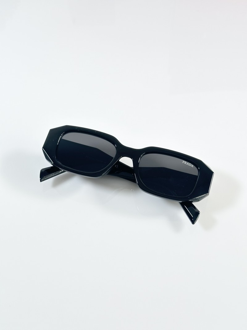111 Prada 8679 Black Sunglasses with dark lenses and angular geometric frame