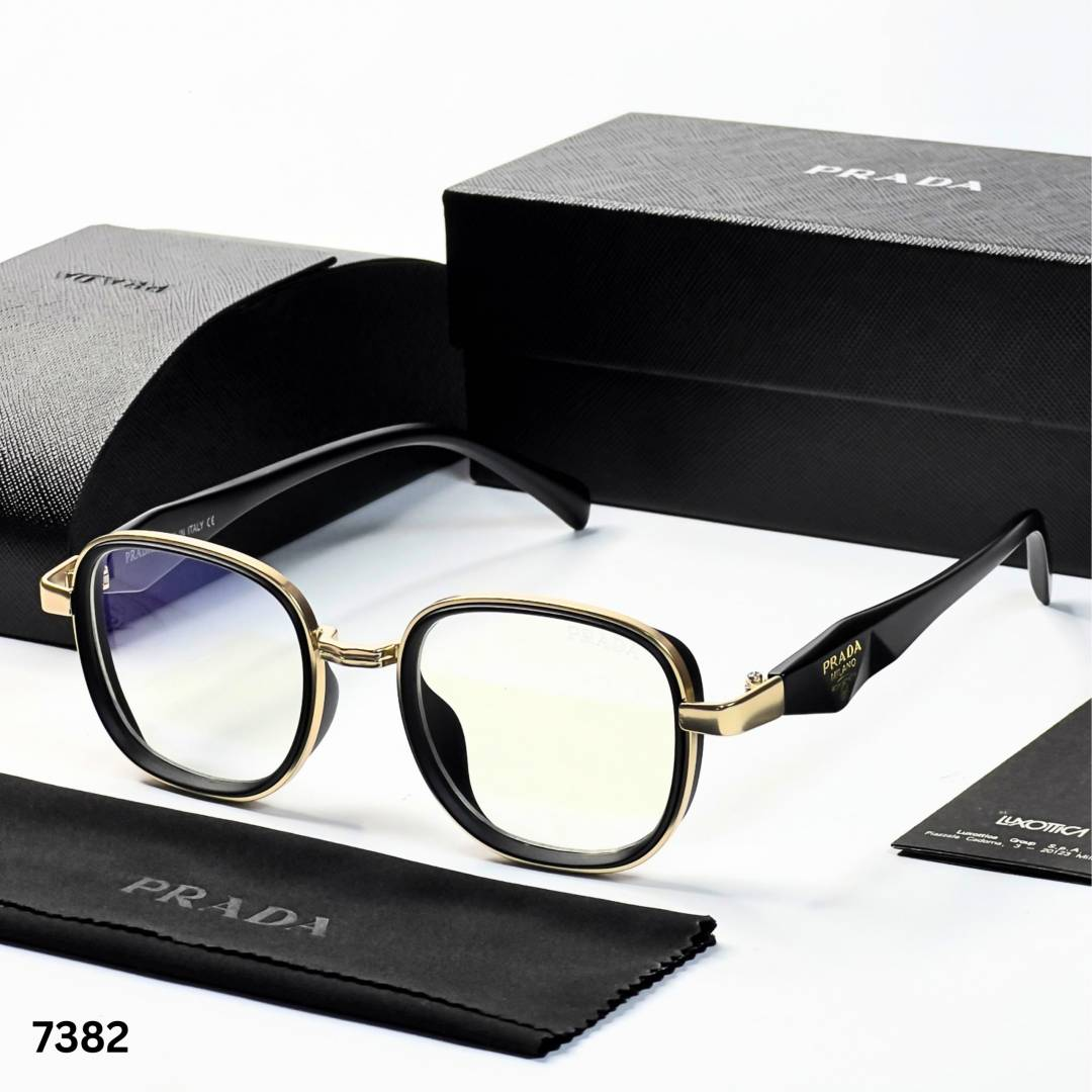 17 Prada 7382 Gold Plano Glasses with black and gold geometric frame