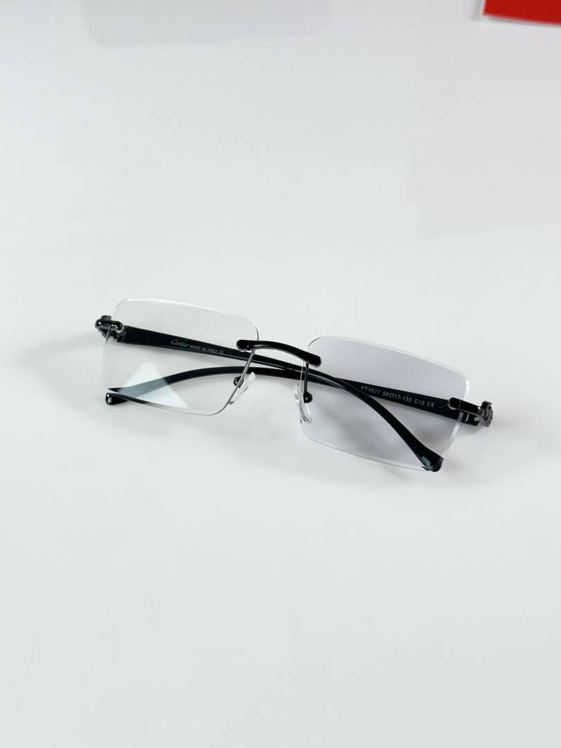 181 Cartier 1027 Black Photochromic Glasses with rimless rectangular color-changing lenses