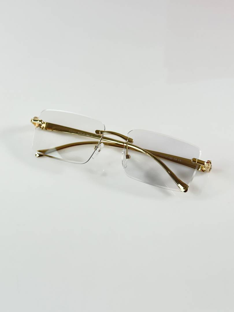 199 Cartier 1027 Gold Black Photochromic Glasses with rimless rectangular color-changing lenses