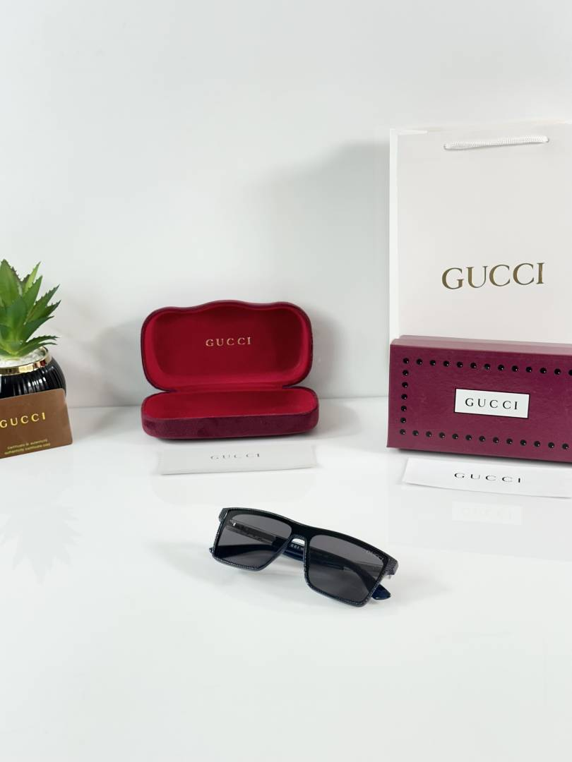 203 Gucci 2203 Blue Black Sunglasses with dark rectangular lenses and textured frame