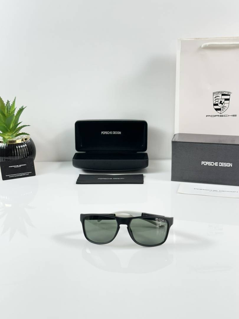 209 Porsche Design 004 Black Green Sunglasses with rectangular frame and green lenses