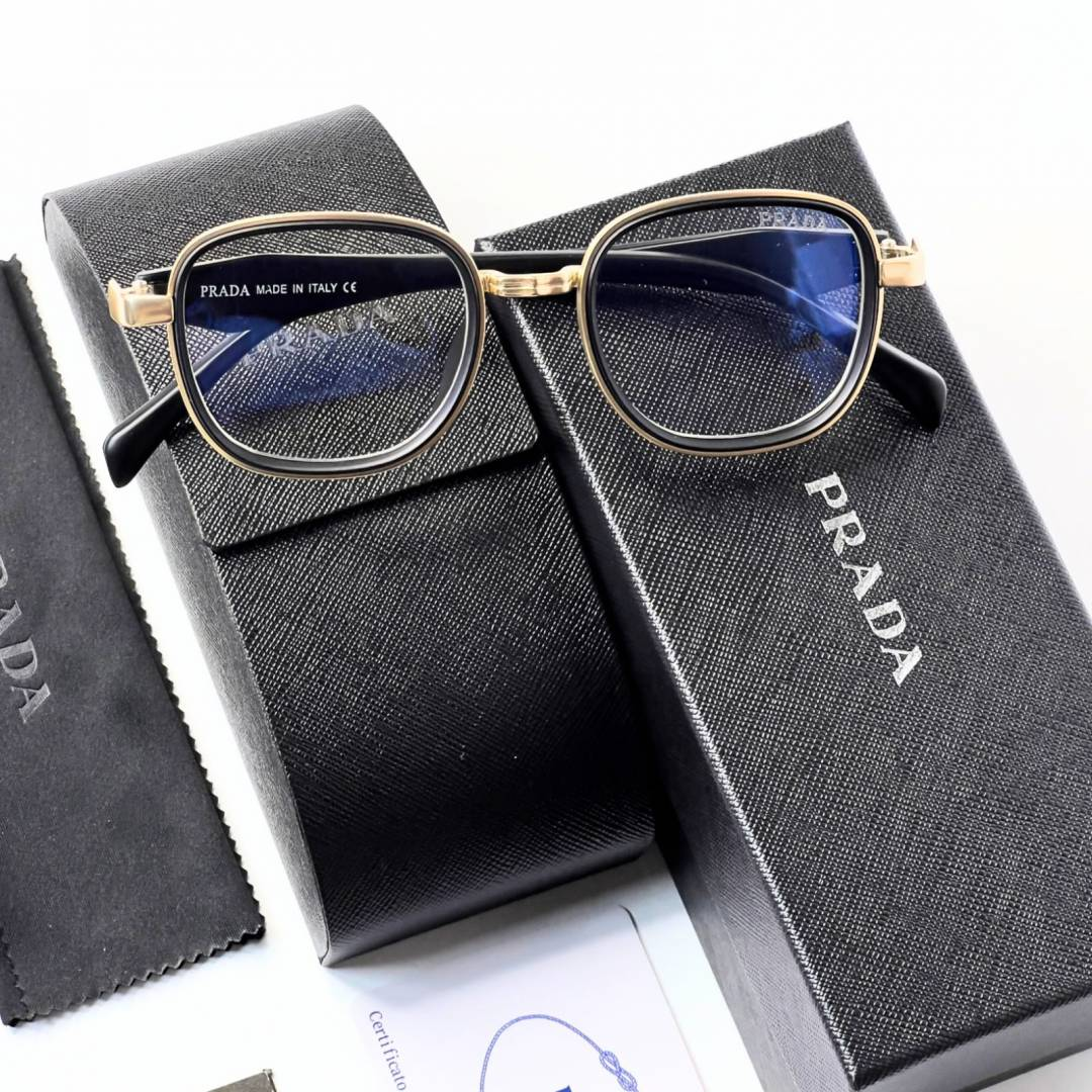 21 Prada 7382 Gold Plano Glasses with black and gold geometric frame