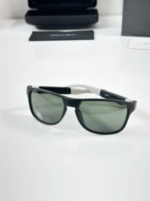 Porsche Design 004 Black Green Sunglasses with rectangular frame and green lenses