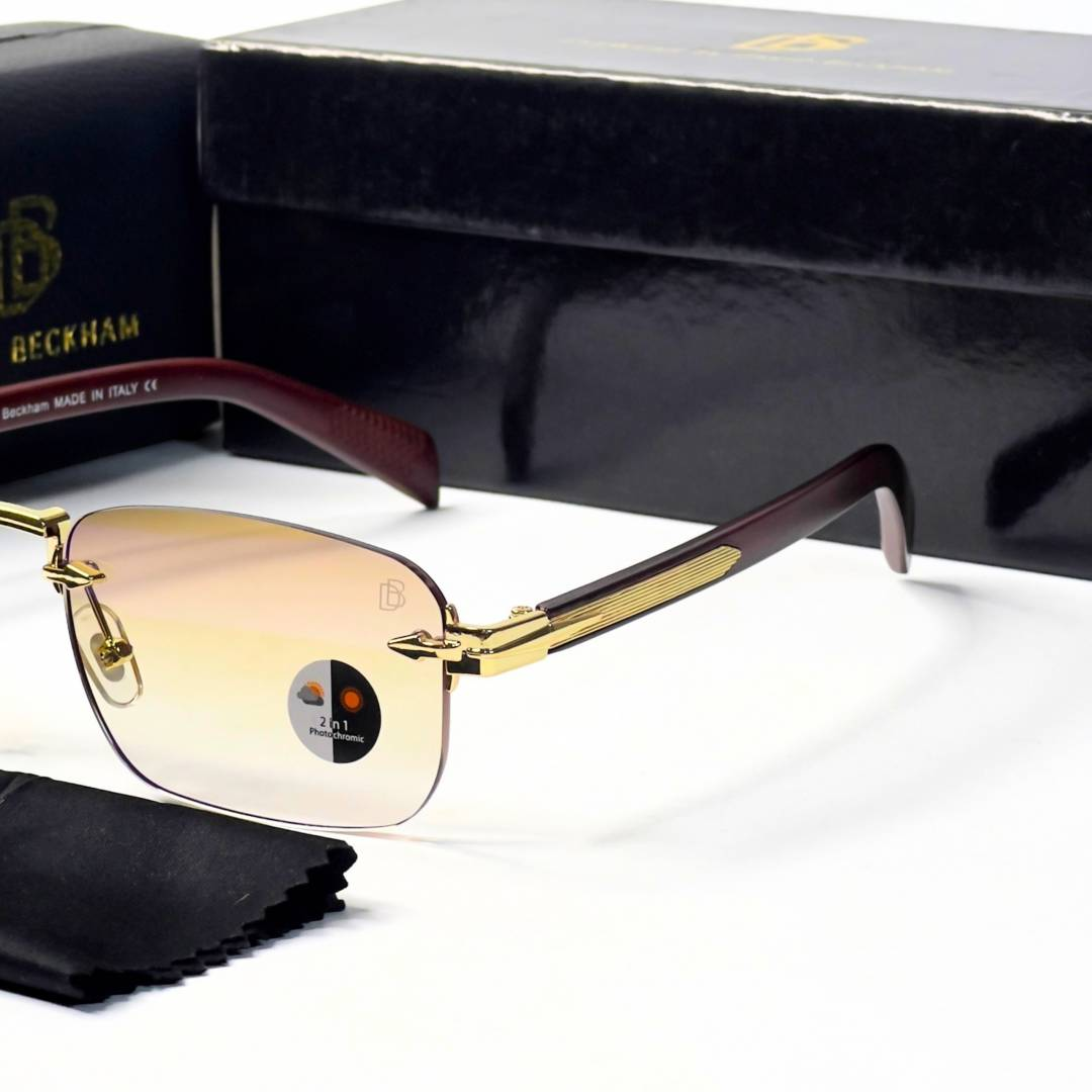 24 David Beckham 202 Gold Brown Sunglasses with rimless rectangular lenses