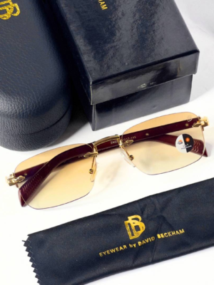 David Beckham 202 Gold Brown Sunglasses with rimless rectangular lenses