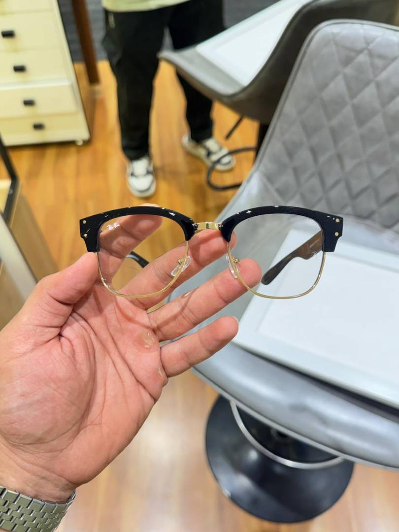 36 Ray-Ban 0504 Gold Plano Glasses with black browline frame and clear lenses