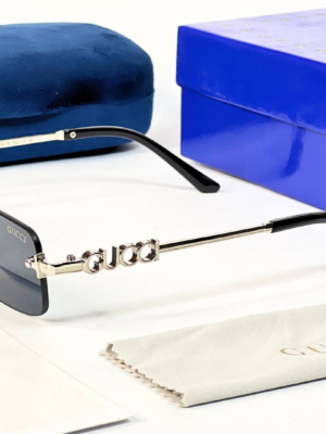 Gucci 59011 Silver Black rimless sunglasses with rectangular dark lenses