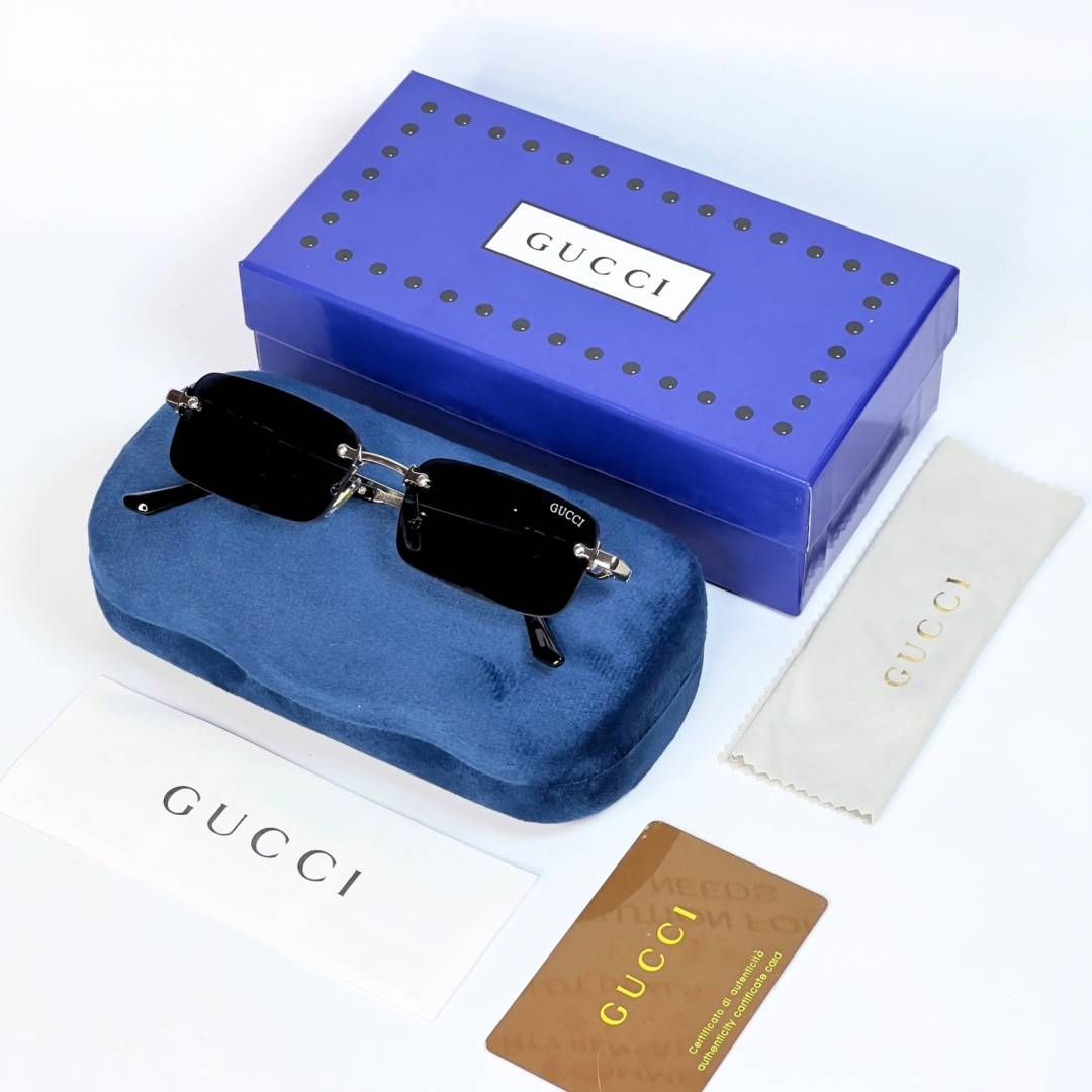 43 Gucci 59011 Silver Black rimless sunglasses with rectangular dark lenses