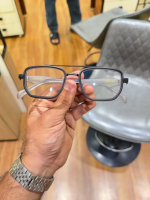 Prada 7384 Grey Plano Glasses with rectangular frame and clear lenses