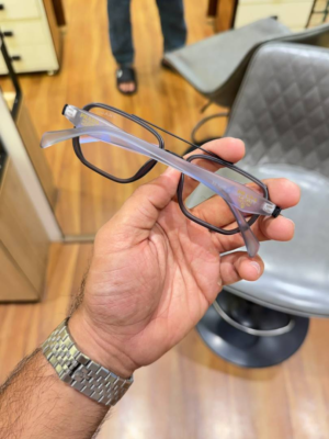 Prada 7384 Grey Plano Glasses with rectangular frame and clear lenses