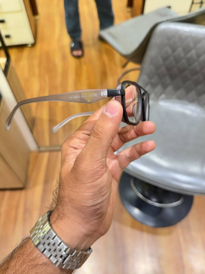 Prada 7384 Grey Plano Glasses with rectangular frame and clear lenses