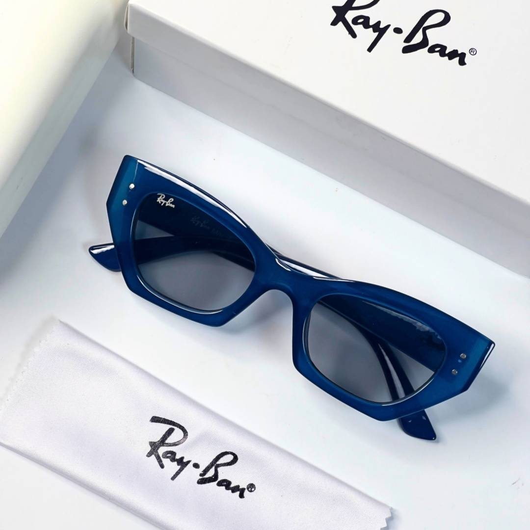 58 Ray-Ban 288 Blue Grey Sunglasses with translucent blue frame and grey lenses