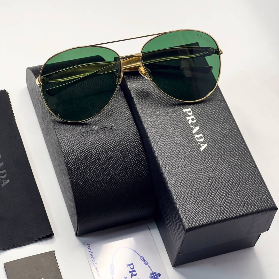 65 Prada 25008 Gold Green Sunglasses with aviator-style gold frame and green lenses