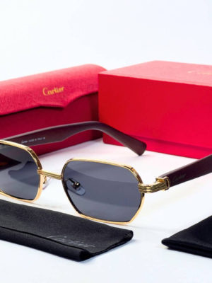 Cartier 704 Gold Black Sunglasses with geometric dark lenses and gold-tone frame