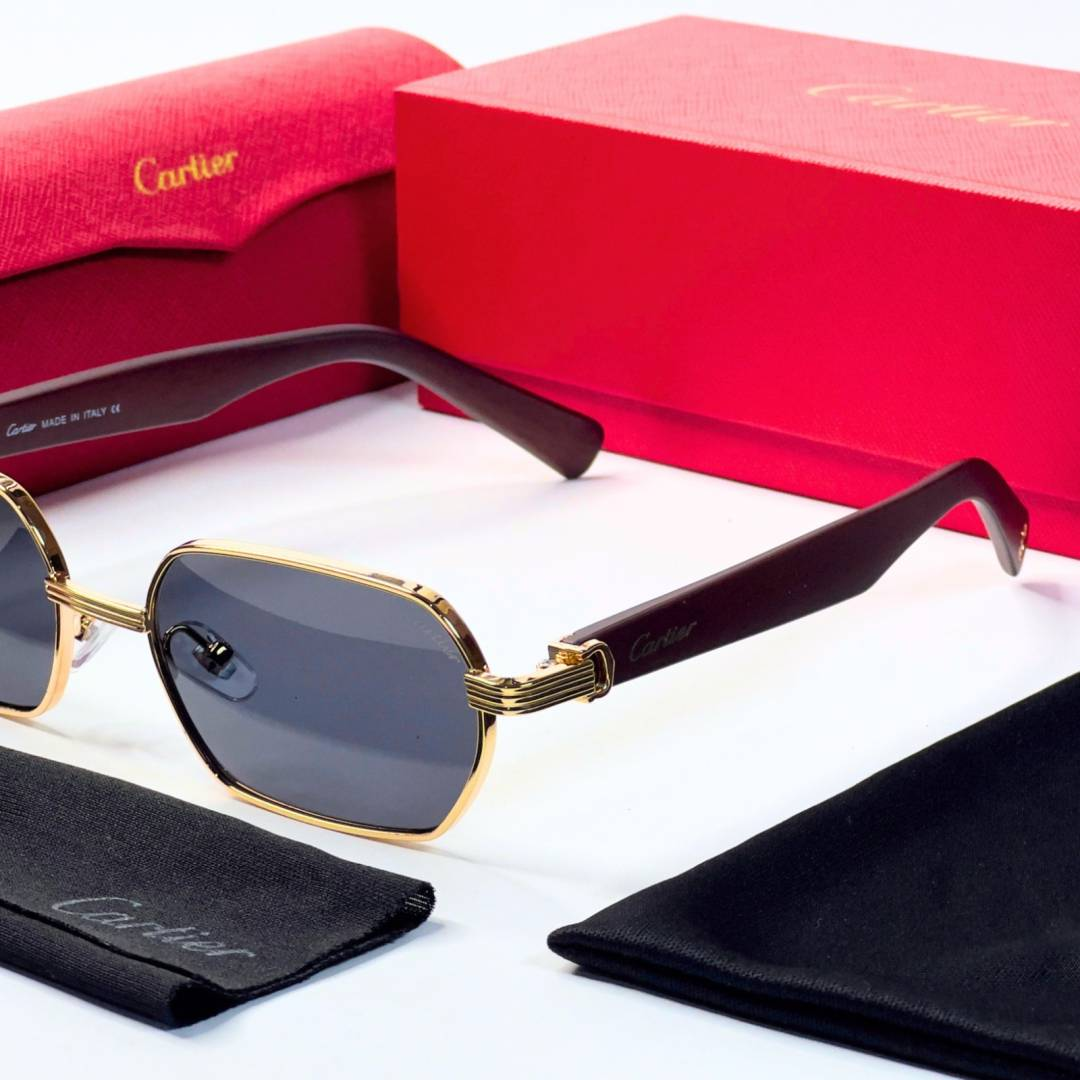 77 Cartier 704 Gold Black Sunglasses with geometric dark lenses and gold-tone frame