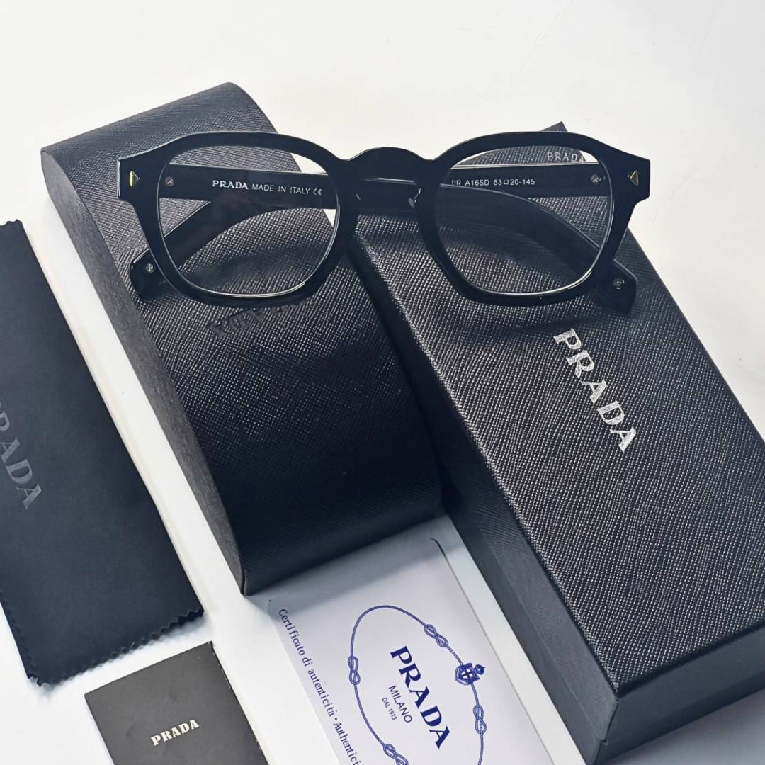 83 Prada 331 Black Gold Plano Glasses with square black frame and clear lenses