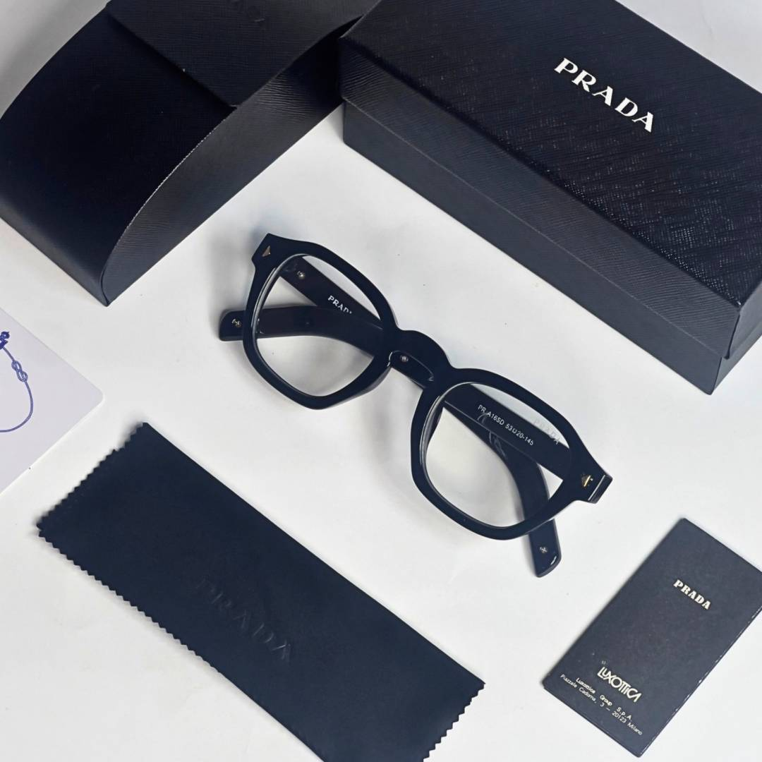 84 Prada 331 Black Gold Plano Glasses with square black frame and clear lenses