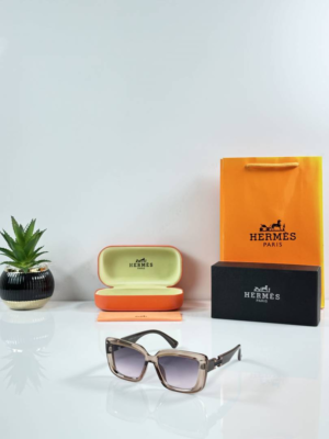 Hermes Paris WMNS 0534 Water Brown sunglasses with translucent brown square frames and purple-grey gradient lenses