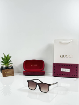 Guccii 0381 Brown square sunglasses with brown gradient lenses and gold-tone temple detailing