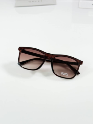 Guccii 0381 Brown square sunglasses with brown gradient lenses and gold-tone temple detailing
